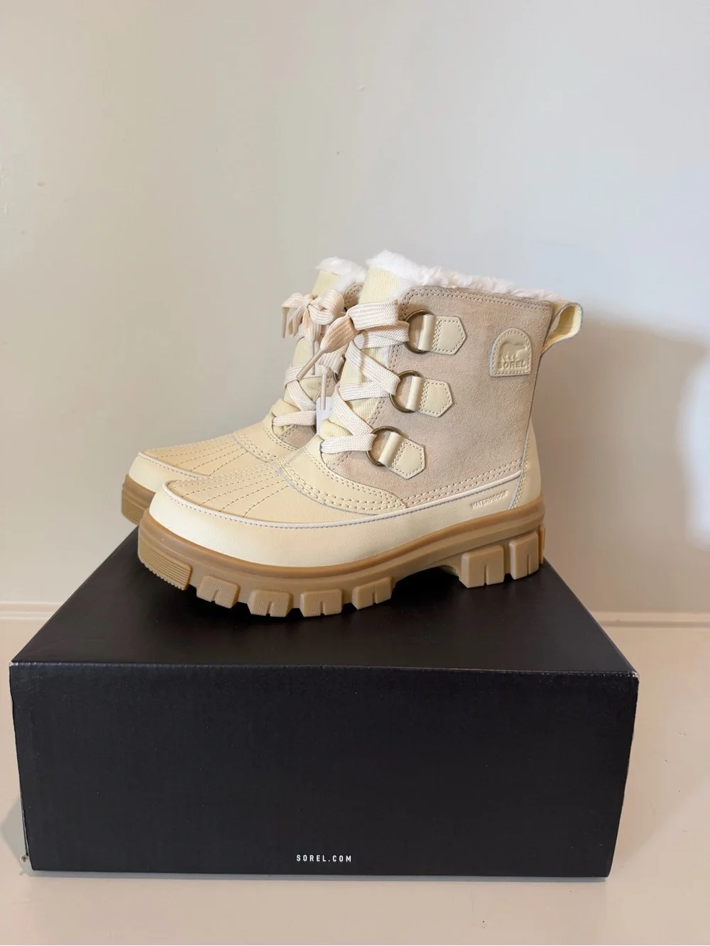 Sorel Cream and Tan Winter Lace-Up Boots with Faux Fur Collar